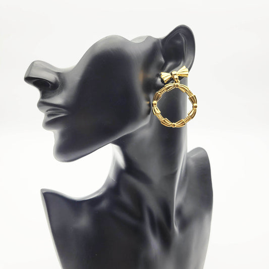 Vintage bow dangle earrings Nina Ricci