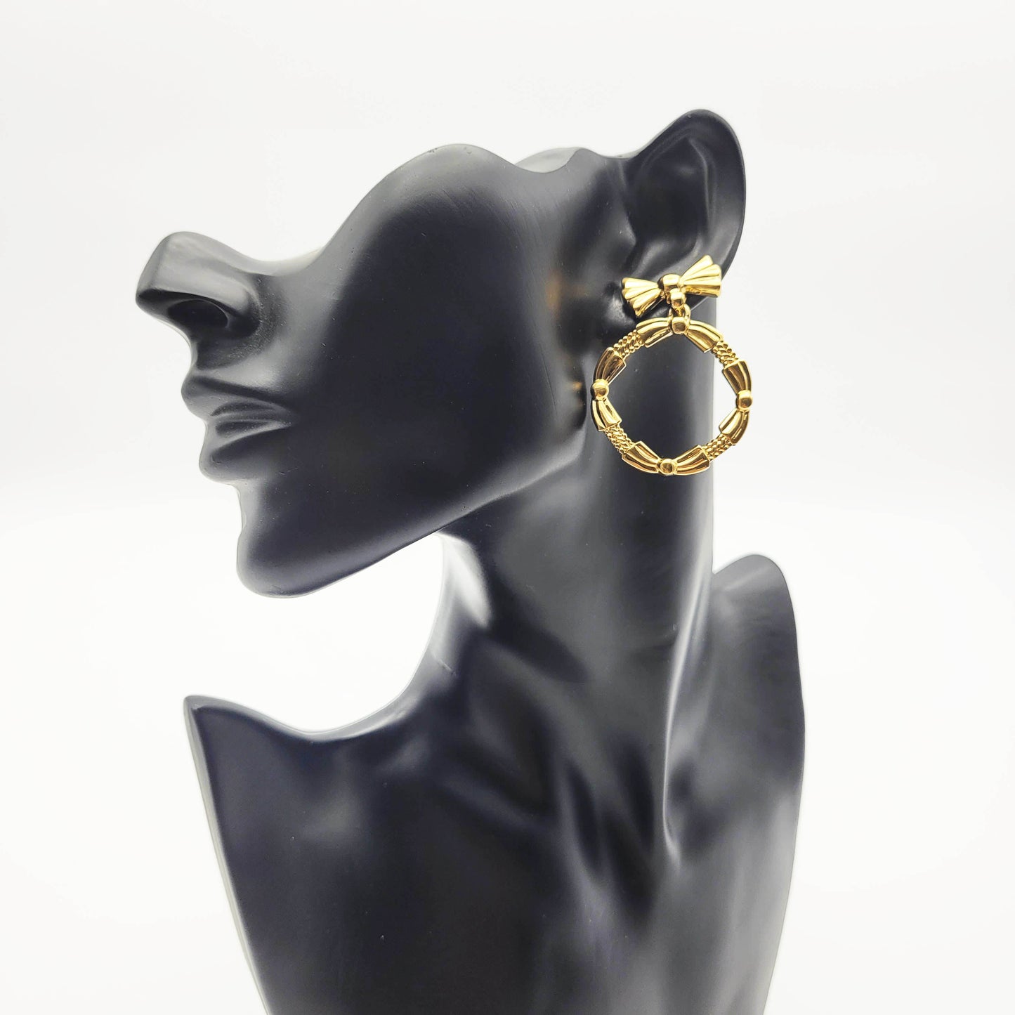 Vintage bow dangle earrings Nina Ricci