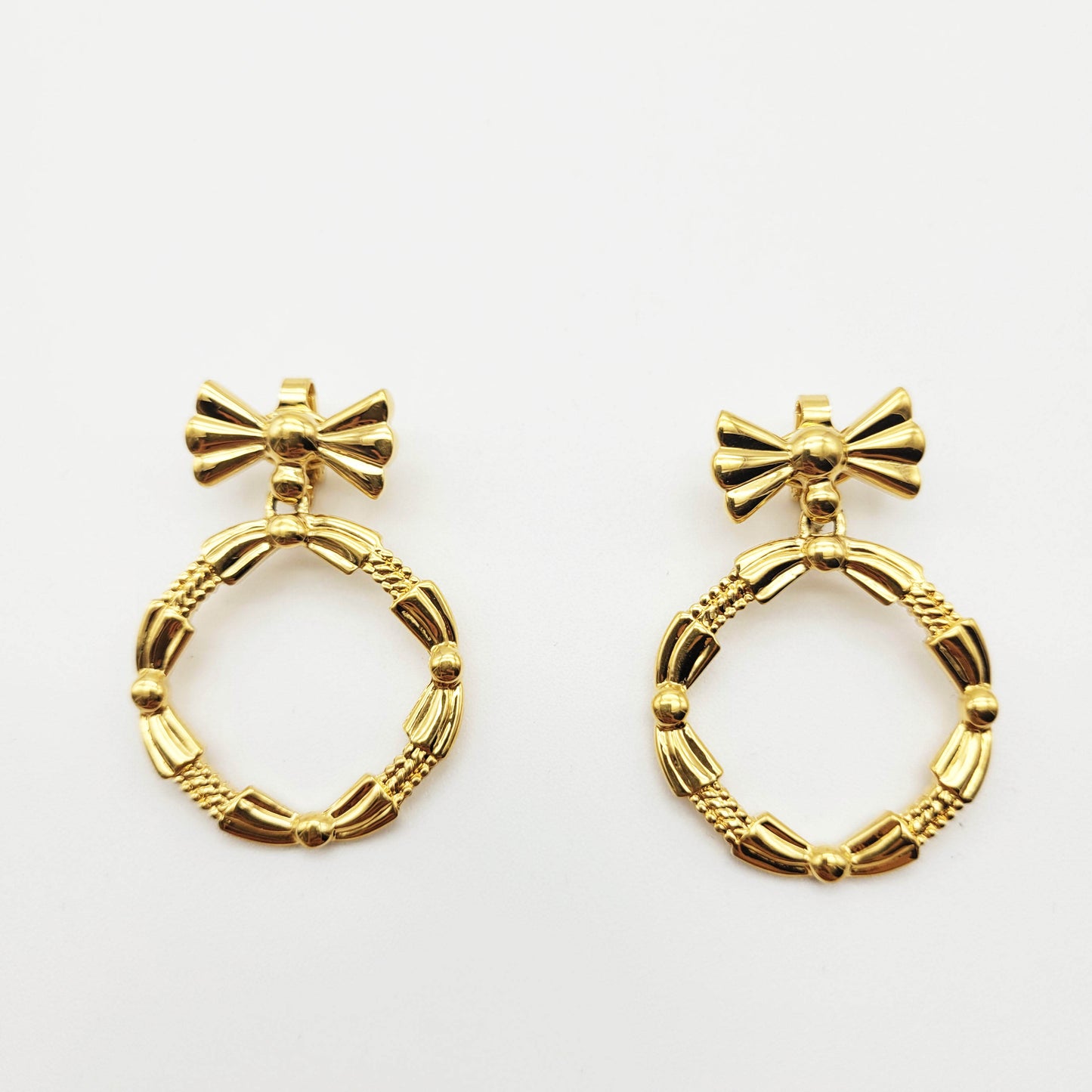Vintage bow dangle earrings Nina Ricci