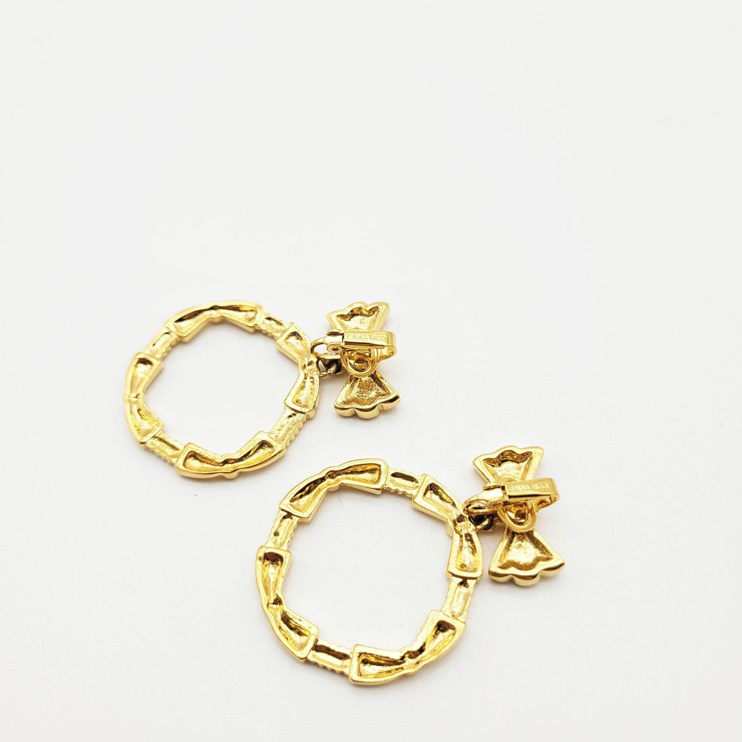 Vintage bow dangle earrings Nina Ricci