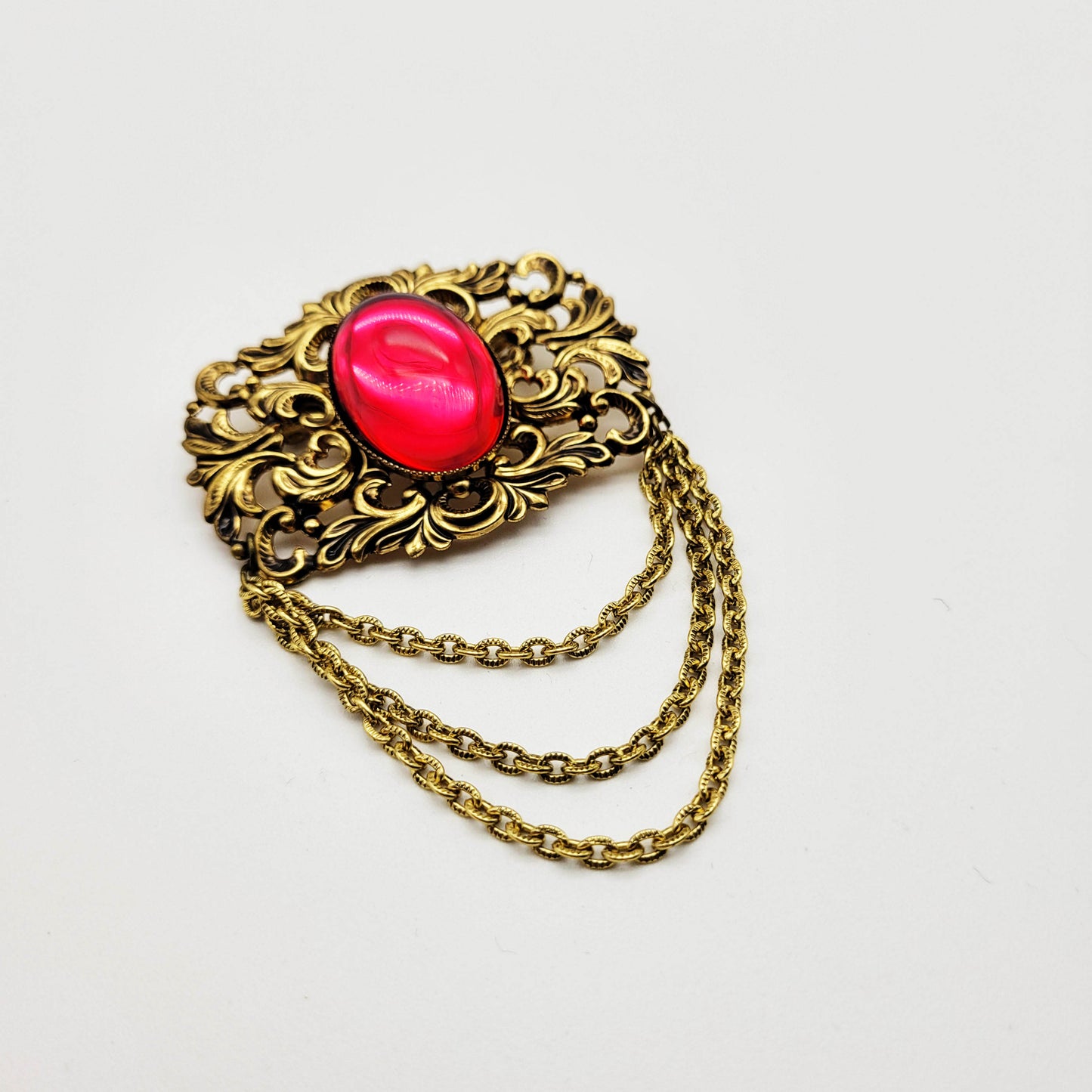 Vintage pink cabochon brooch