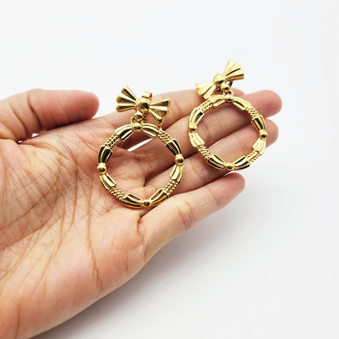 Vintage bow dangle earrings Nina Ricci