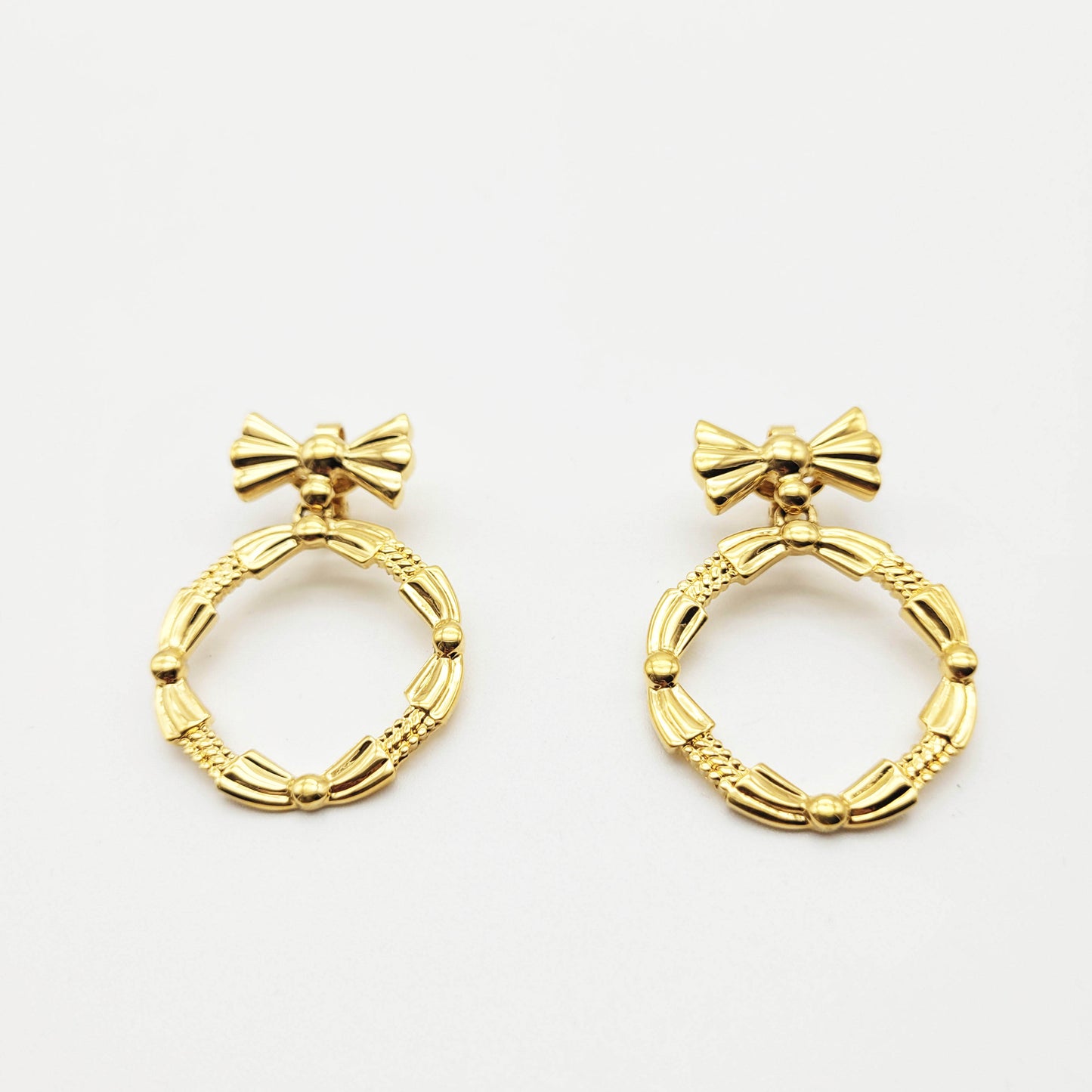 Vintage bow dangle earrings Nina Ricci